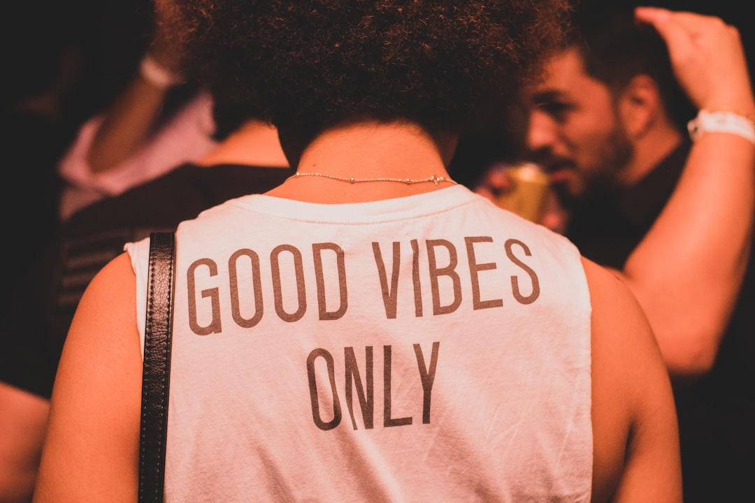 Good Vibes Only - person at event representing vibe coding and creative energy